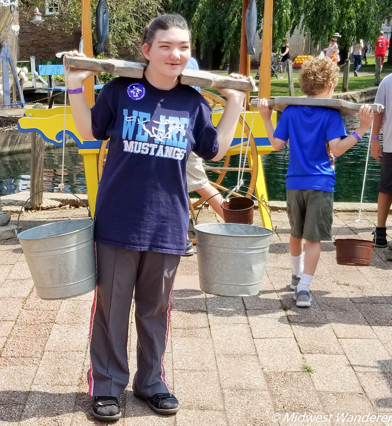 Carrying the water at Dutch Village