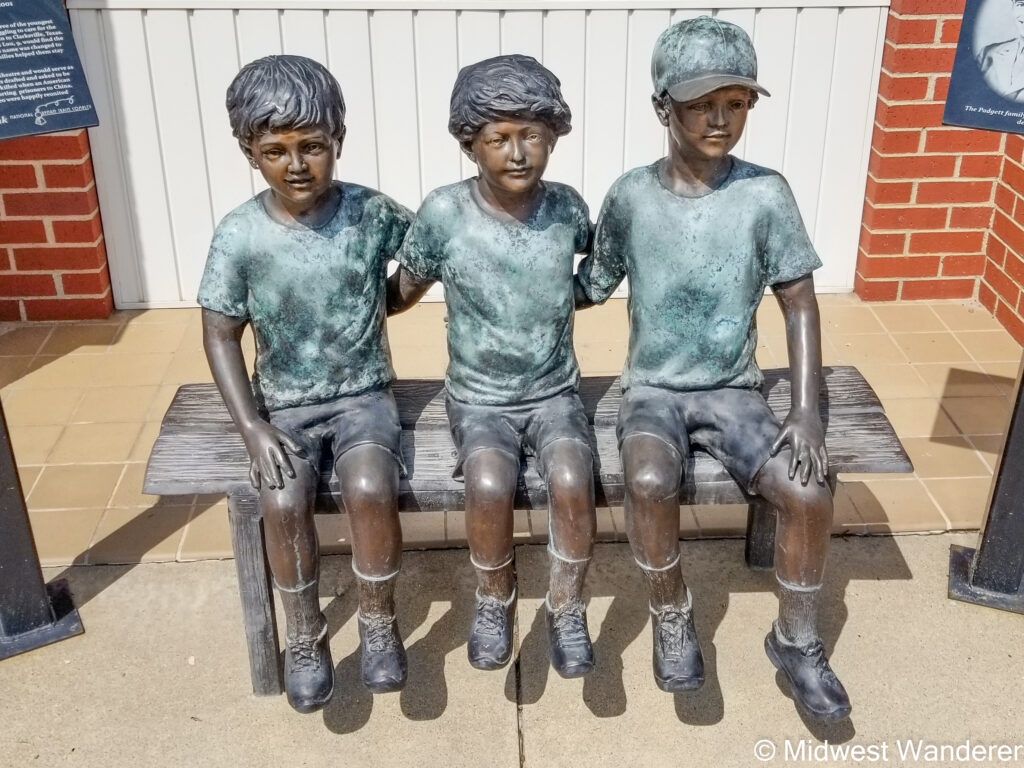 Statue that represents orphan train riders in downtown Concordia, Kansas