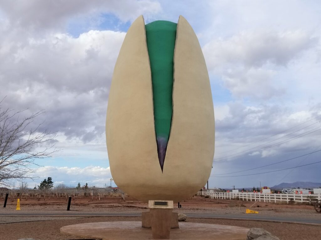 The roadside attraction featured in this issue of the Midwest Wanderer newsletter is the World's Largest Pistachio at McGinn's Tree Ranch in Alamogordo, New Mexico