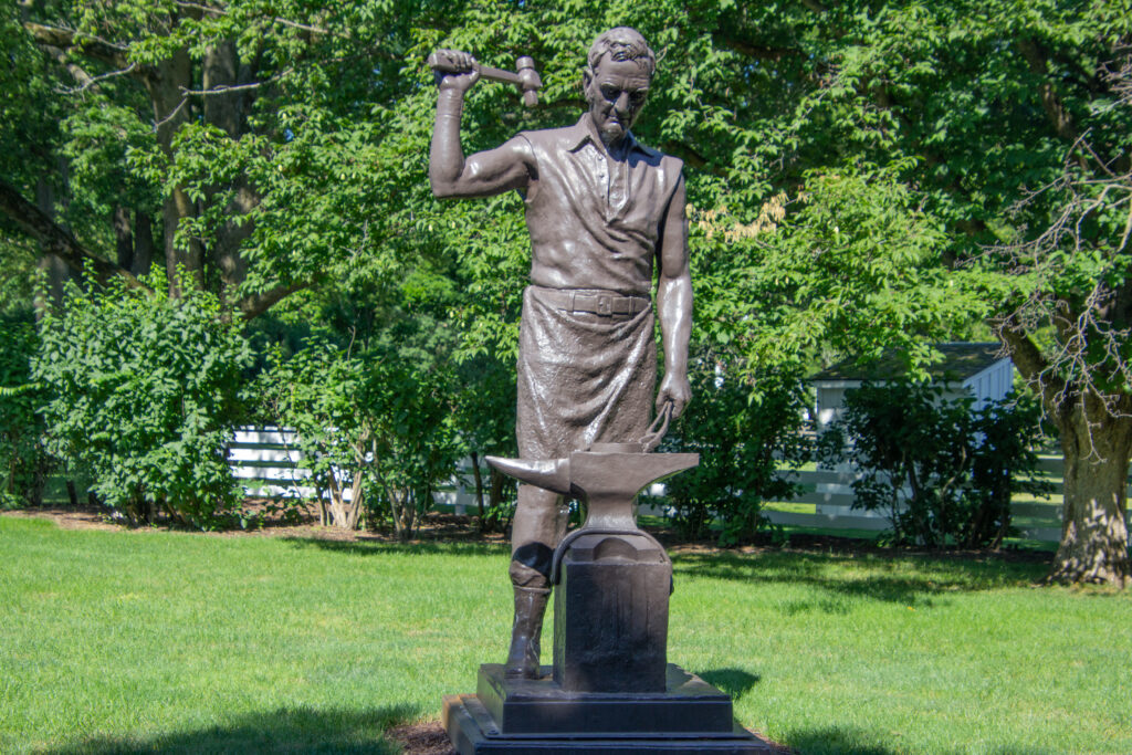 statue of John Deere on the grounds of the John Deere Historic Site