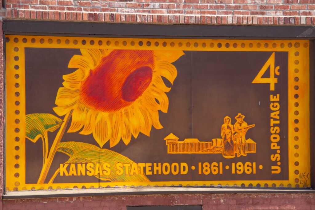 Mural of a postage stamp in Abilene. The four-cent stamp commemorates the Kansas Statehood centennial in 1961