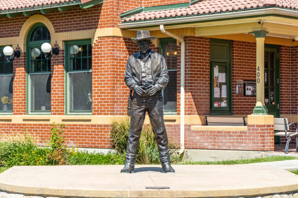 Statue of James Arness as Matt Dillon outside the Dodge City Visitor Center