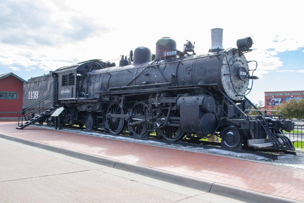 Steam locomotive and tender car
